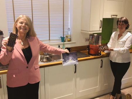 Harriett Baldwin MP sees Irma Goder’s home-based chocolate making at first hand