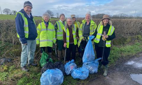  Harriett Baldwin MP with local litter-pickers with bags of rubbish picked up from the verges of the edge of Clifton upon Teme.