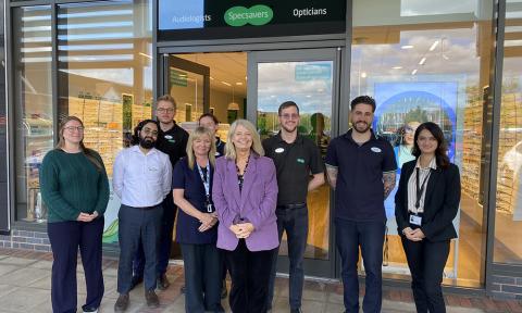 Dame Harriett Baldwin MP with the team at Specsavers in Malvern Link